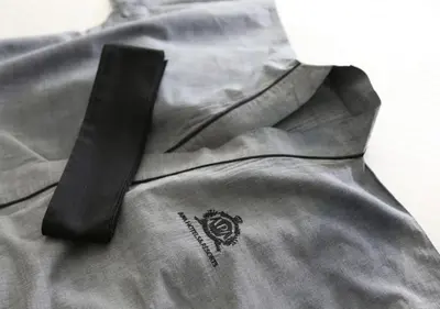 a close up of a shirt with a black zipper at APA Hotel Shinjuku Gyoemmae in Tokyo
