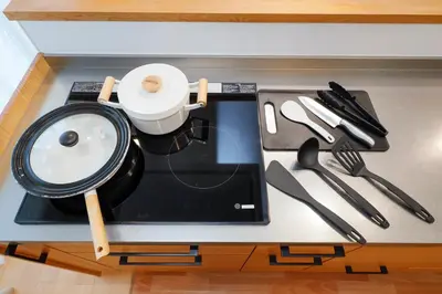 a table with utensils on top of it at Convertel Daita by Tranova in Tokyo