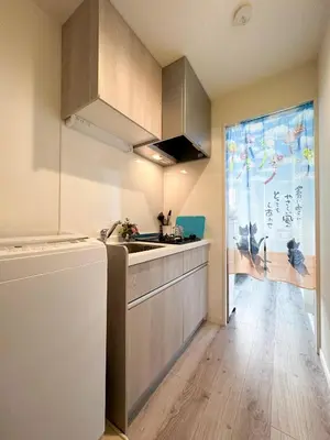 a kitchen with a sink and a counter top at nestay apartment tokyo waseda in Tokyo