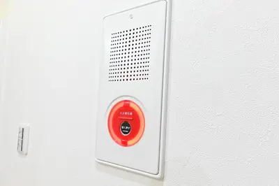 a red and white object is attached to a wall at Ueno Luxury 161m2 Villa 6BR 3Bath 4Toilet 3m to Train Skytree View in Tokyo
