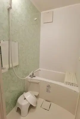 a bathroom with a toilet and a bath tub at belle via tokyo - Vacation STAY 61564v in Tokyo