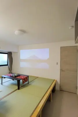 a room with a bench and a table at belle via tokyo - Vacation STAY 61564v in Tokyo