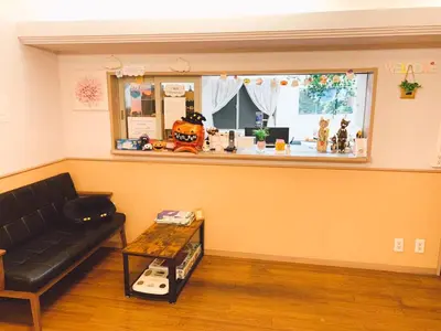 a living room with a couch and a table at Hotel Yuni Star-Club in Tokyo