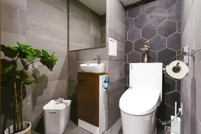 a bathroom with a toilet and a sink at 超级奢华 近秋叶原东京站Kaoa奢华套房带厨房 超豪华戴森&POLA顶级配置 4分钟到东京站 3分钟到地铁 in Tokyo