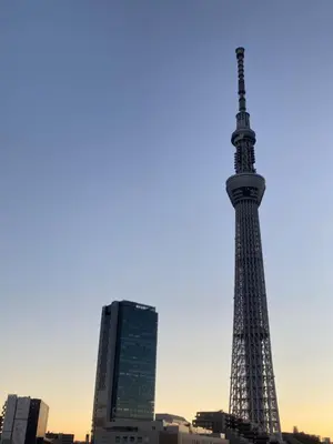 a view of the eiffel tower in a city at Sky Tree INN (\u6674\u6a39\u5bbf\uff09stay ASAKUSA in Tokyo