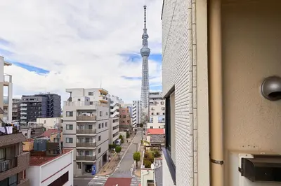a view of a city with a tv tower in the background at \u9326\u7cfb\u753a\u5929\u7a7a\u6a39\u666f\u89c0\u98ef\u5e97 Skytree View Kinshicho - crib free in Tokyo
