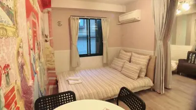 a small living room with a couch and a window at Jing House Koiwa - Vacation STAY 63200v in Tokyo