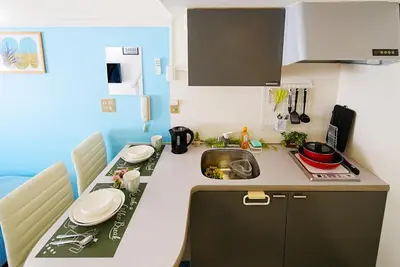 a small kitchen with a sink and a counter at SC 101 Cozy Private Stay with Loft Near Station Free WiFi in Tokyo