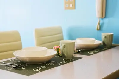 a table with three bowls on a table at SC 101 Cozy Private Stay with Loft Near Station Free WiFi in Tokyo