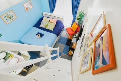 a small room with a bunk bed and a staircase at SC 106 Cozy Private Stay with Loft Near Station Free WiFi in Tokyo