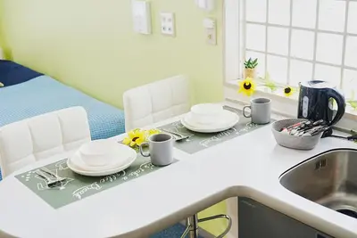a kitchen with a sink and a counter with dishes on it at SC 201 Cozy Private Stay with Loft Near Station Free WiFi in Tokyo
