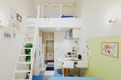 a room with a bunk bed and a desk at SC 203 Cozy Private Stay with Loft Near Station Free WiFi in Tokyo