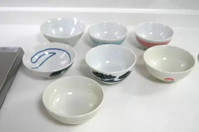 a group of bowls sitting on top of a table at Space Air Building 3F - Vacation STAY 11441 in Tokyo
