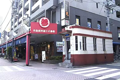 a building with a sign for a restaurant on a street at Space Air Building 3F - Vacation STAY 11441 in Tokyo