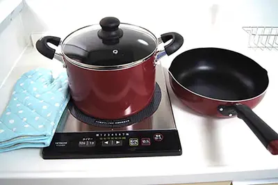 a pot on a stove with a pan on it at Space Air Building 3F - Vacation STAY 11441 in Tokyo