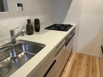 a kitchen with a sink and a stove at Private Hotel Season Spring - Vacation STAY 71133v in Tokyo