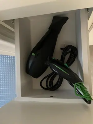 a black umbrella in a white box with cables at Private Hotel Season Spring - Vacation STAY 71133v in Tokyo