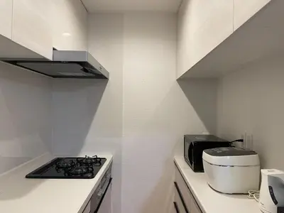 a kitchen with a stove and a toaster oven at Private Hotel Season Spring - Vacation STAY 71133v in Tokyo