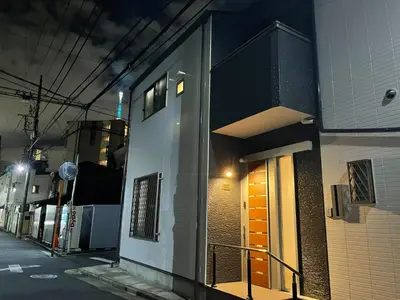 a building with a door on the side of it at Private Hotel Season Spring - Vacation STAY 71133v in Tokyo