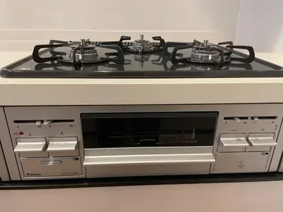 a stove top oven sitting in a kitchen at Private Hotel Season Spring - Vacation STAY 71133v in Tokyo