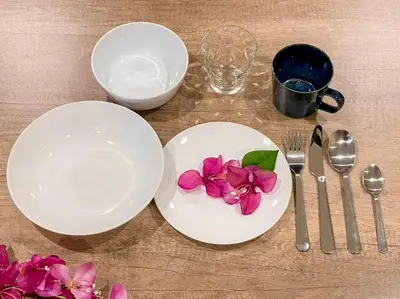 a table with two plates with flowers on it at Dolce Shibuya in Tokyo