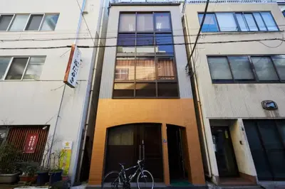 a bike parked in front of a building at TokyoGuest Akihabara in Tokyo