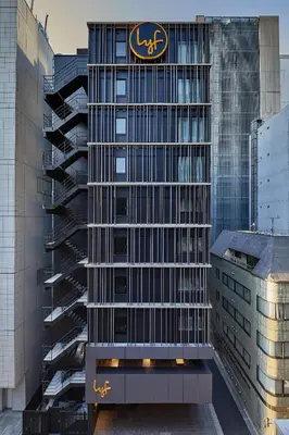 a building with a logo on the side of it at lyf Ginza Tokyo in Tokyo