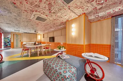 a room with a table and a bike in it at lyf Ginza Tokyo in Tokyo