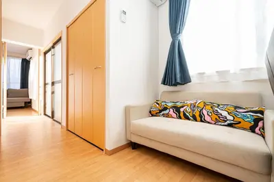 a living room with a couch and a window at Asakusa-SK-TT0322 in Tokyo