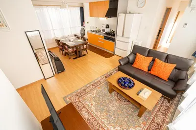 a living room with a couch and a table at Asakusa-SK-TT0322 in Tokyo