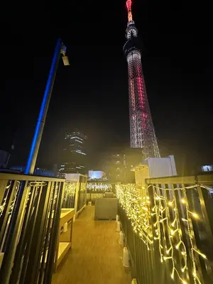 a view of the eiffel tower at night at THE BONDS HOTEL TOKYO in Tokyo
