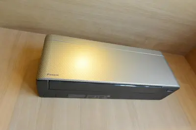 a television sitting on top of a wooden floor at THE BONDS HOTEL TOKYO in Tokyo