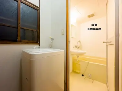 a bathroom with a sink and a toilet and a tub at 7\u6642IN19\u6642OUT # \u6c60\u888b\u738b\u5b50\u8d64\u7fbd\u99c5\u7121\u6599\u9001\u8fce# \u4e0a\u91ce\u99c514\u5206 # \u65e5\u66ae\u91cc\u99c510\u5206 # \u4e00\u68df\u8cb8\u5207 # \u6700\u59277\u540d # B # 7 00 IN19 00 OUT # Free pick up Ikebukuro Oji and Akabane Stations # 14 min to Ueno # 10 min to Nippori # Whole house rental # Max 7 # B in Tokyo