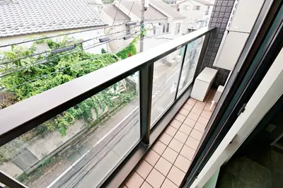 a balcony with a view of a street at The Masters Stay SETAGAYA KYODO in Tokyo