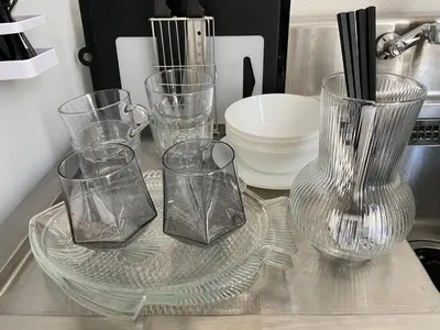 a group of glass vases sitting on a table at 1 stop to Shinjuku! Central NAKANO! up to 3ppl.cozy bright room. in Tokyo