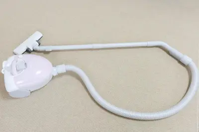a white headset with a cord on a table at Hirojo Building 203,303,403,603,703 - Vacation STAY 15451 in Tokyo