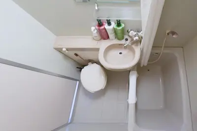 a small bathroom with a sink and a toilet at Hirojo Building 203,303,403,603,703 - Vacation STAY 15454 in Tokyo