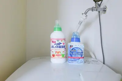 two bottles of milk sitting on a table next to a lamp at Hirojo Building 203,303,403,603,703 - Vacation STAY 15454 in Tokyo
