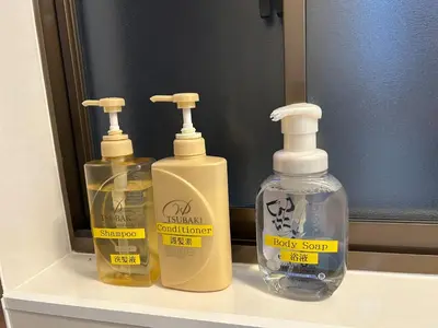 two bottles of laundry detergent sitting on a shelf at Stay Dream Hotel - Vacation STAY 75122v in Tokyo