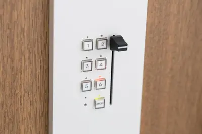 a picture of a white wall with a bunch of switches at SLEEPLAB THE STAY \u6e0b\u8c37 -\u7761\u7720\u7279\u5316\u578bHotel- in Tokyo