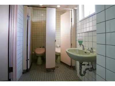 a bathroom with a sink and a toilet at Male Only Capsule Inn Hamamatsucho - Vacation STAY 68799v in Tokyo