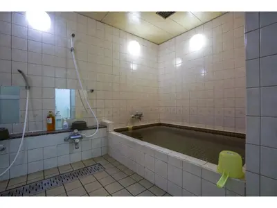 a bathroom with a bath tub with a shower at Male Only Capsule Inn Hamamatsucho - Vacation STAY 68799v in Tokyo