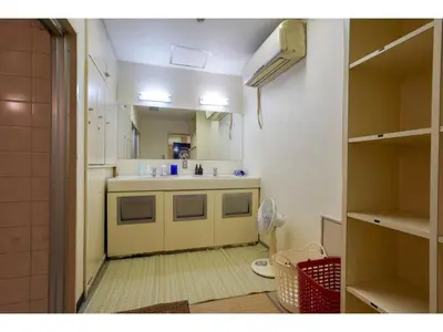 a small kitchen with a sink and a counter at Male Only Capsule Inn Hamamatsucho - Vacation STAY 68799v in Tokyo