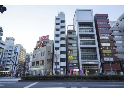 a city street with tall buildings in a city at Male Only Capsule Inn Hamamatsucho - Vacation STAY 68799v in Tokyo