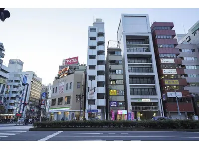 a city street with tall buildings in a city at Male Only Capsule Inn Hamamatsucho - Vacation STAY 68799v in Tokyo
