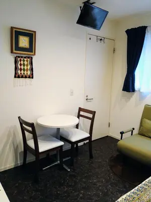 a room with a table and chairs and a door at Tokyo stay Hut SARI - Vacation STAY 84619v in Tokyo