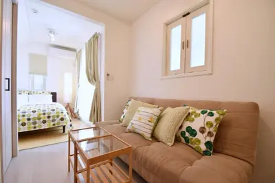 a living room with a couch and a bed at Magical Dream House ★ Maihama - Vacation STAY 12402 in Tokyo