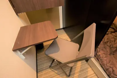 a desk and a chair next to a table at Ryoma Ikebukuro female only Guest House Vacation STAY 16032v in Tokyo