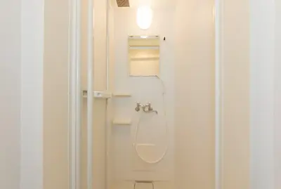 a bathroom with a shower with a sink and a toilet at Ryoma Ikebukuro female only -Guest House- Vacation STAY 16045v in Tokyo
