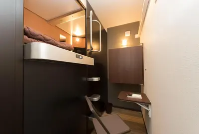 a small room with a bed on top of it at Ryoma Ikebukuro male only -Guest House - Vacation STAY 14547v in Tokyo